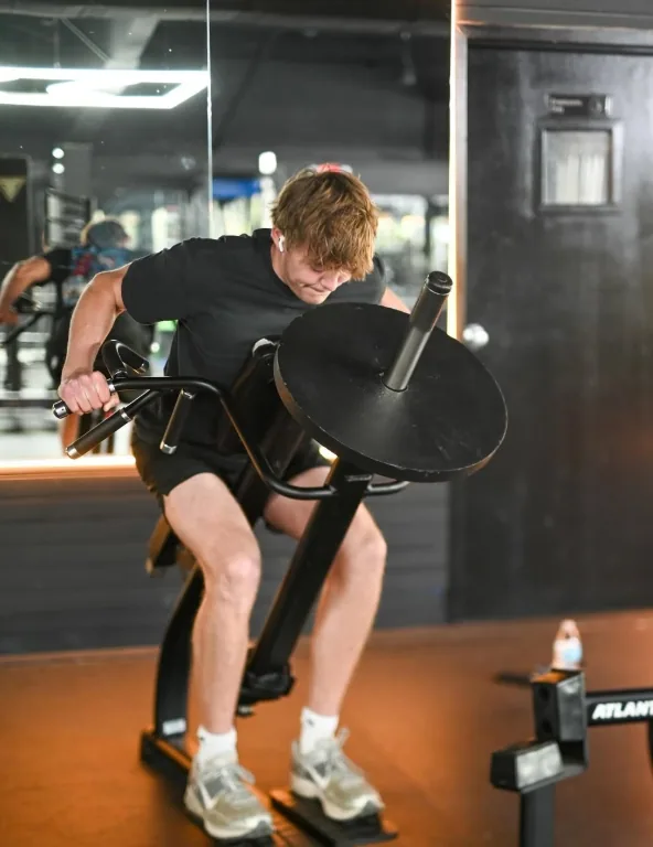 Member training with strength equipment at Fuel Fortress